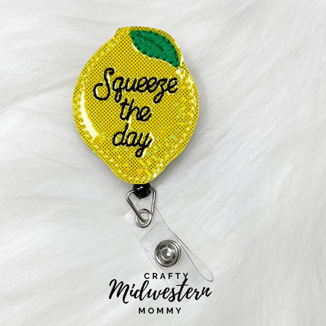 Squeeze the day lemon badge reel